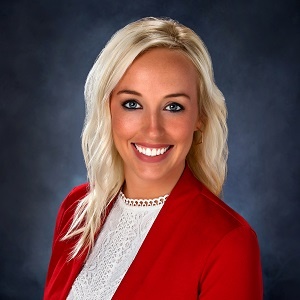 Residential Lender Courtney Carter in a red suit