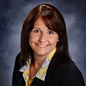 Whitney Morrow of Treasury Management in a suit Whitney Morrow of Treasury Management in a suit