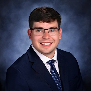 Austin Nelson in a suit and tie Austin Nelson in a suit and tie