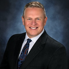 Jim Batton Jim in a suit and tie