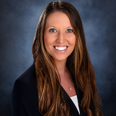 Kelly Warren of Treasury Management in a suit Kelly Warren of Treasury Management in a suit
